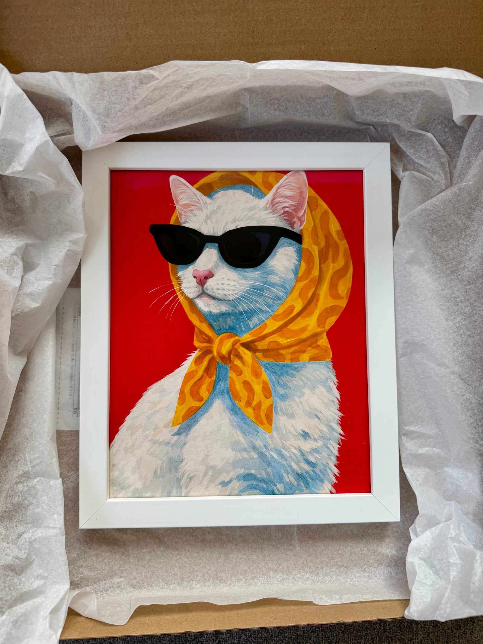 Customer unboxing photo of a modern framed custom pet poster